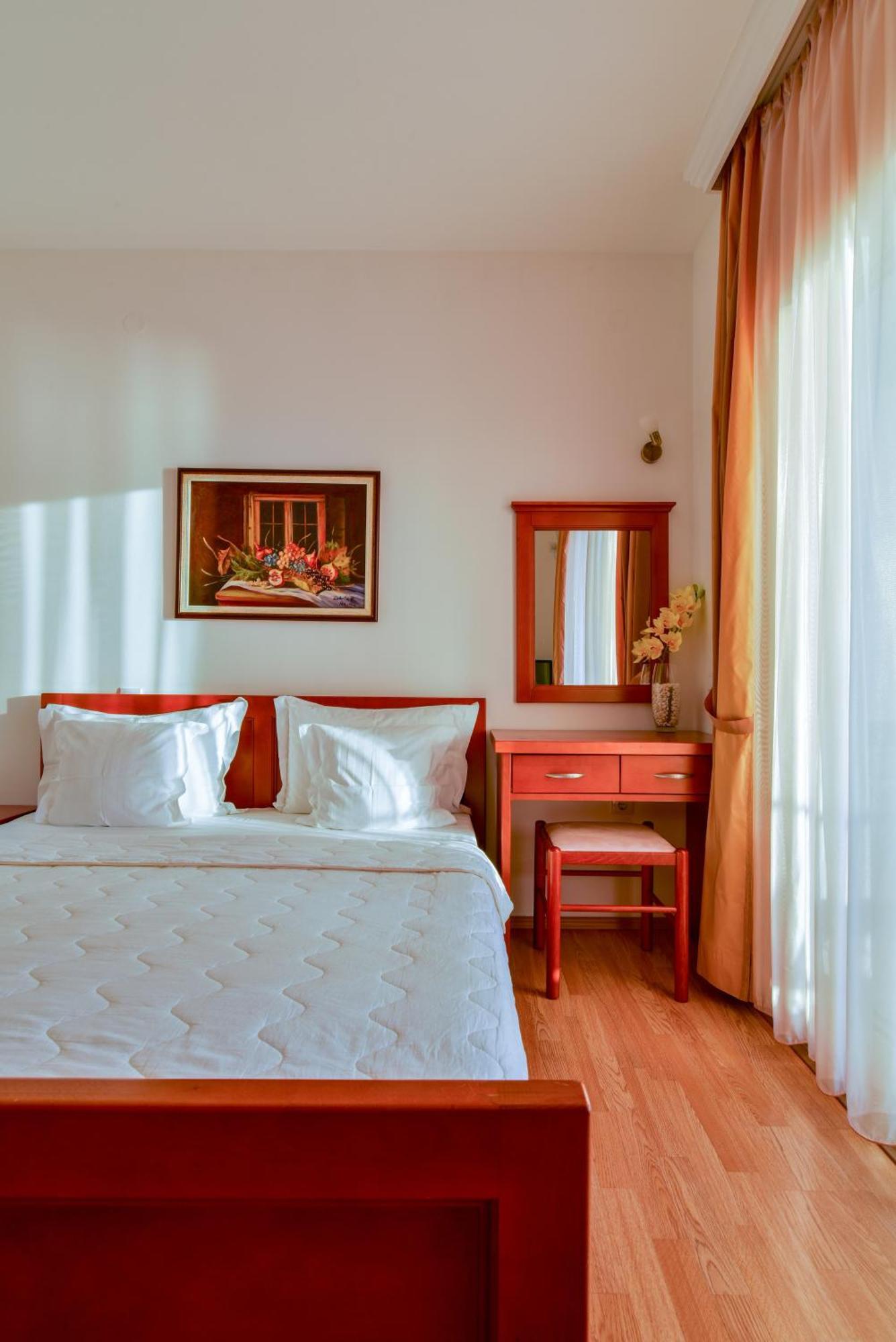 Apartments Leut Ilha Sveti Stefan Quarto foto